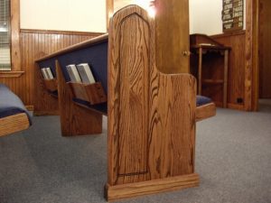 ends of pews and bible holders