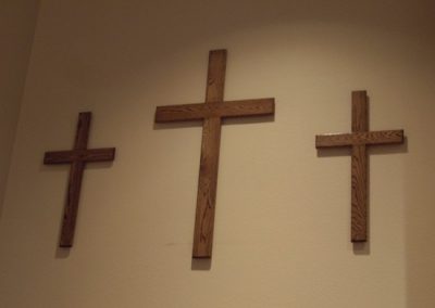 three wooden crosses